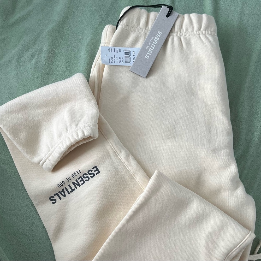 essentials cream sweatpants